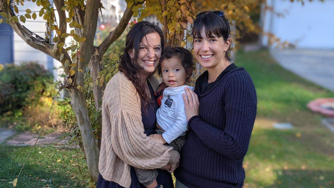 Julie Gras-Najjar (left) and her sister Adèle pictured with Julie’s son Ziya in 2021.