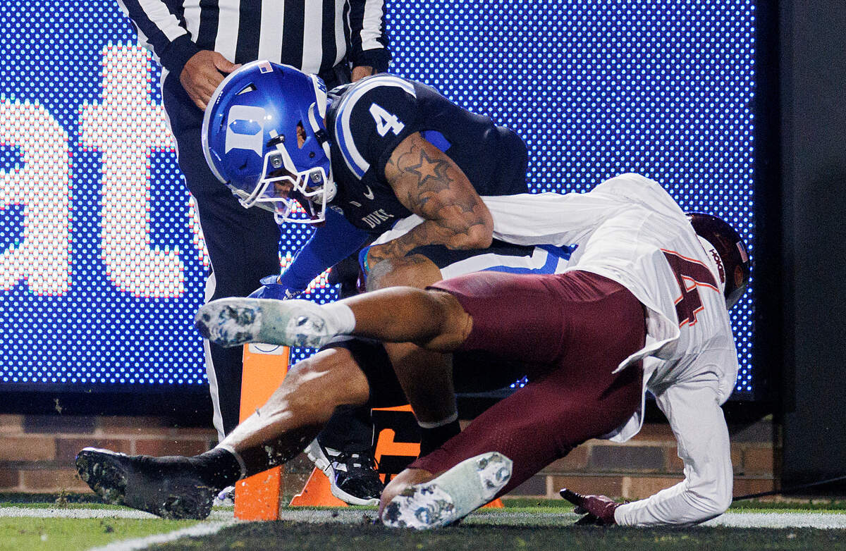 Duke’s Eli Pancol catches a pass from quarterback Maalik Murphy to score a touchdown during the first half of the Blue Devils’ 31-28 win on Saturday, Nov. 23, 2024, at Wallace Wade Stadium in Durham, N.C.