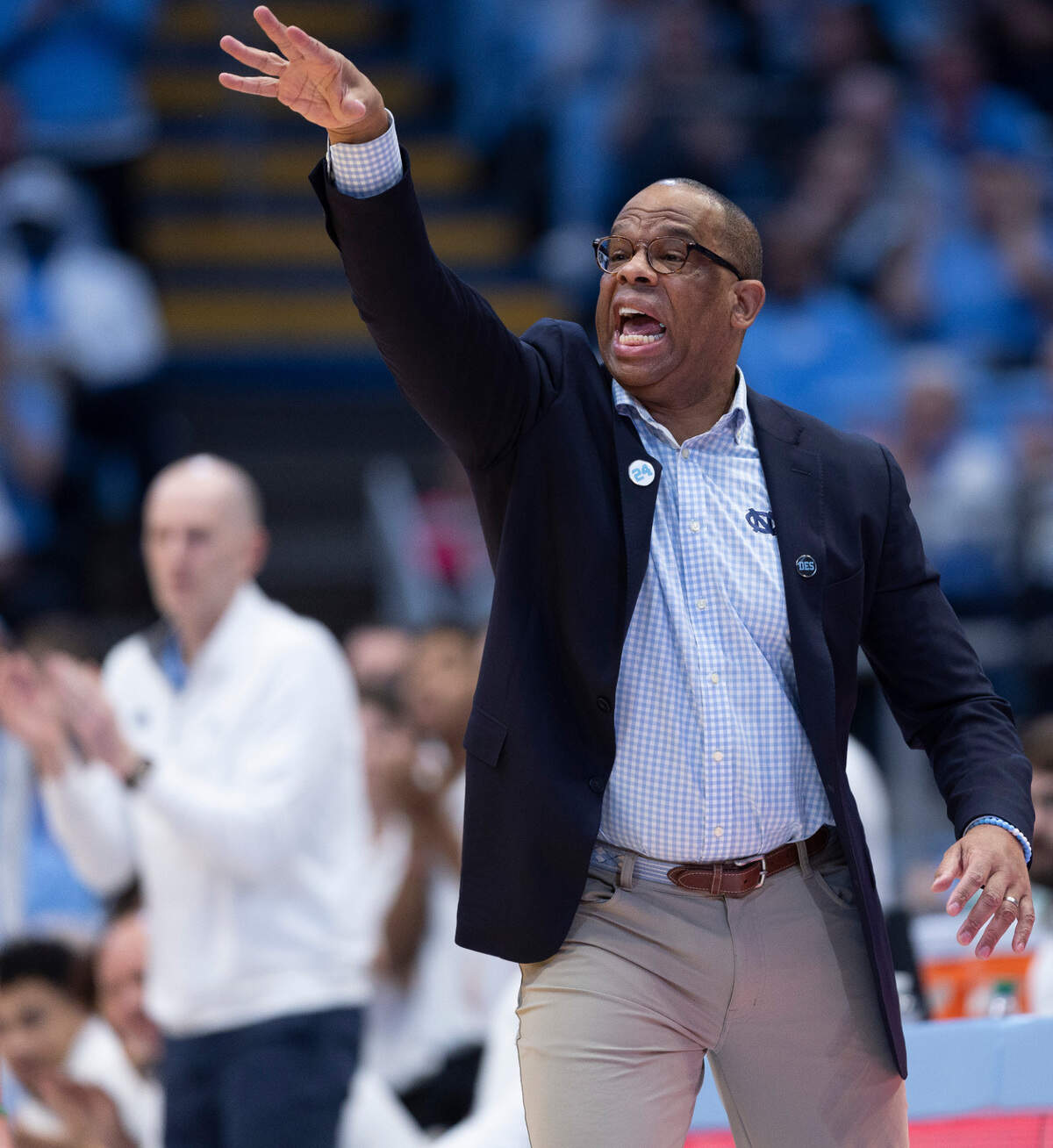 North Carolina coach Hubert Davis yells instructions to his team in the first half against Syracuse on Saturday, January 13, 204 at the Smith Center in Chapel Hill, N.C.