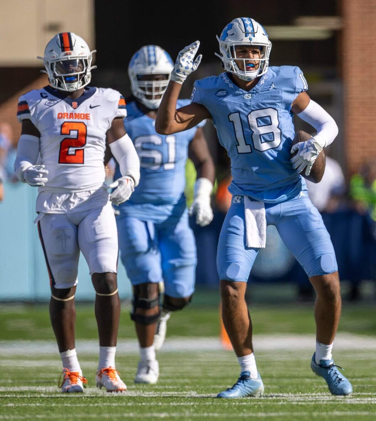 North Carolina’s Bryson Nesbit (18) reacts after securing a first down on a 13-yard completion from quarterback Drake Maye in the fist quarter against Syracuse on Saturday, October 7, 2023 at Kenan Stadium in Chapel Hill, N.C.