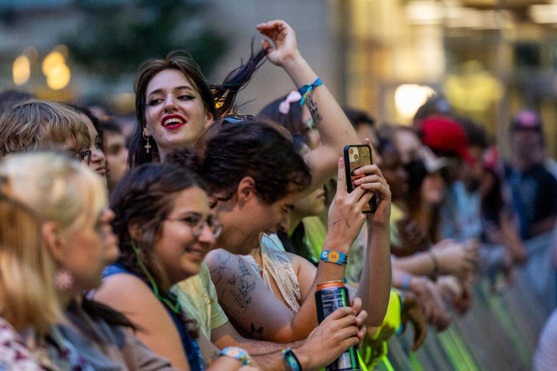 Concert-goers watch MJ Lenderman and the Wind perform at City Plaza in Raleigh during the Hopscotch Music Festival on Friday, Sept. 6, 2024.