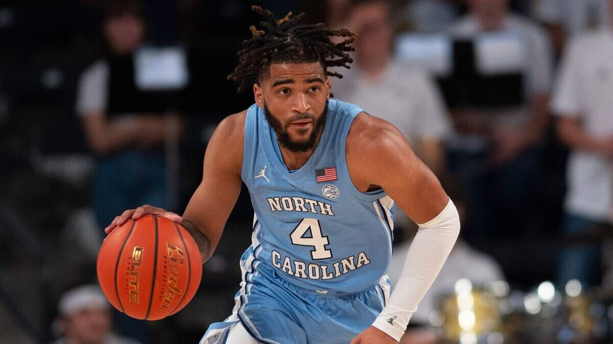 North Carolina guard R.J. Davis (4) dribbles during the first half of an NCAA college basketball game against Georgia Tech, Sunday, Dec. 5, 2021, in Atlanta. (AP Photo/Hakim Wright Sr.)