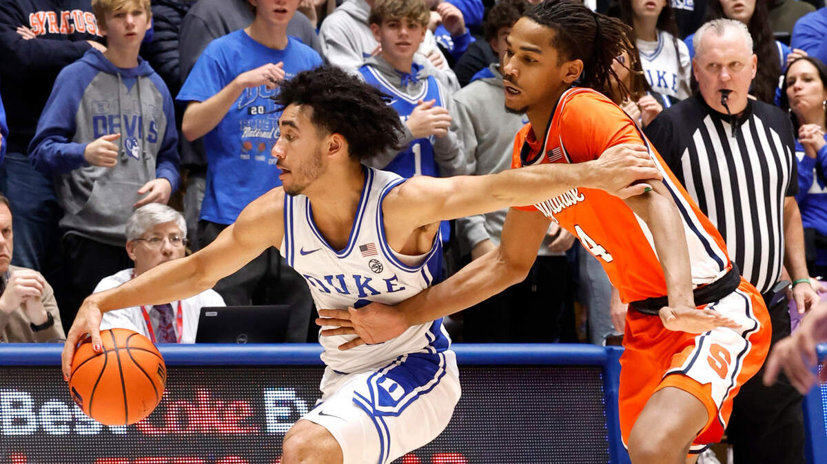 Duke’s Jared McCain (0) keeps the ball from Syracuse’s Chris Bell (4) during the second half of Duke’s 86-66 victory over Syracuse at Cameron Indoor Stadium in Durham, N.C., Tuesday, Jan. 2, 2024.