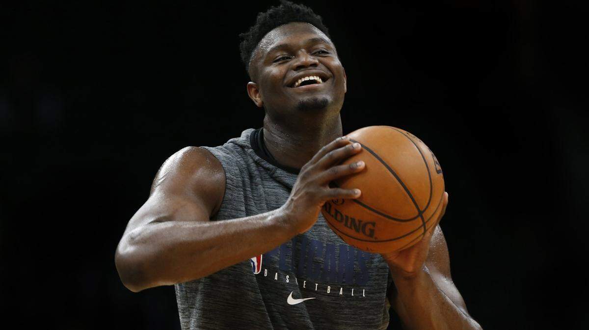 New Orleans Pelicans’ Zion Williamson smiles while practicing before the NBA basketball game between the Boston Celtics and the New Orleans Pelicans Saturday, Jan. 11, 2020, in Boston. (AP Photo/Winslow Townson)