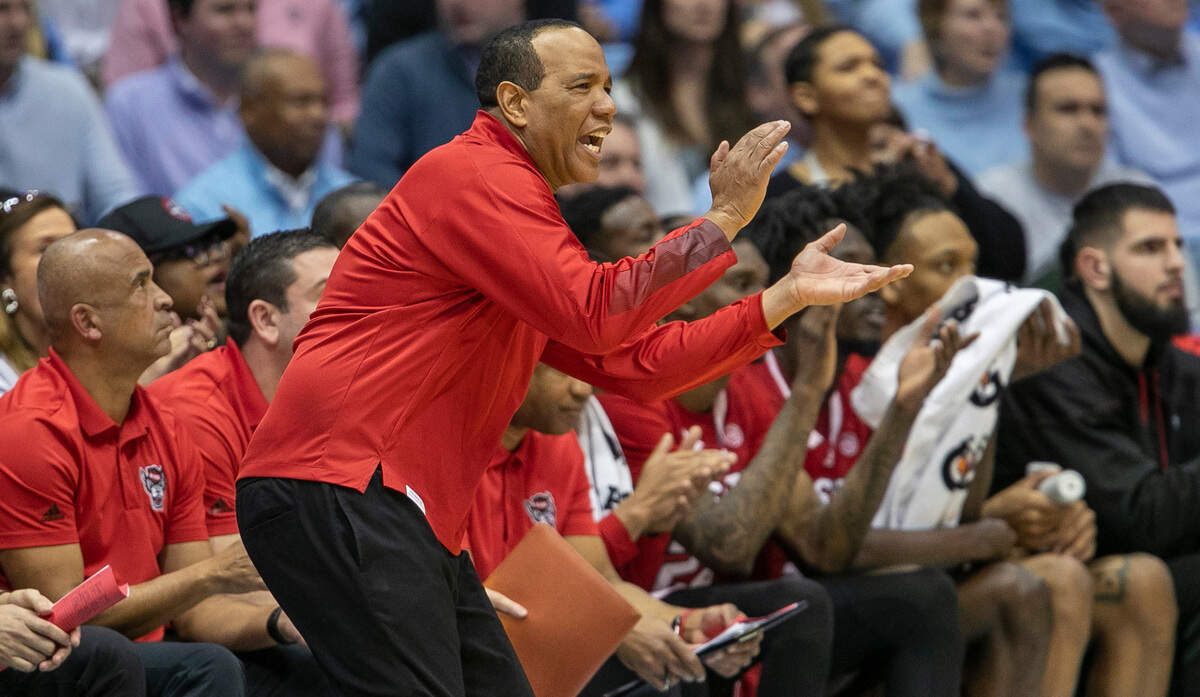 N.C. State coach Kevin Keatts works to inspire his team during the second half against North Carolina on Saturday, January 21, 2023 at the Smith Center in Chapel Hill, N.C.