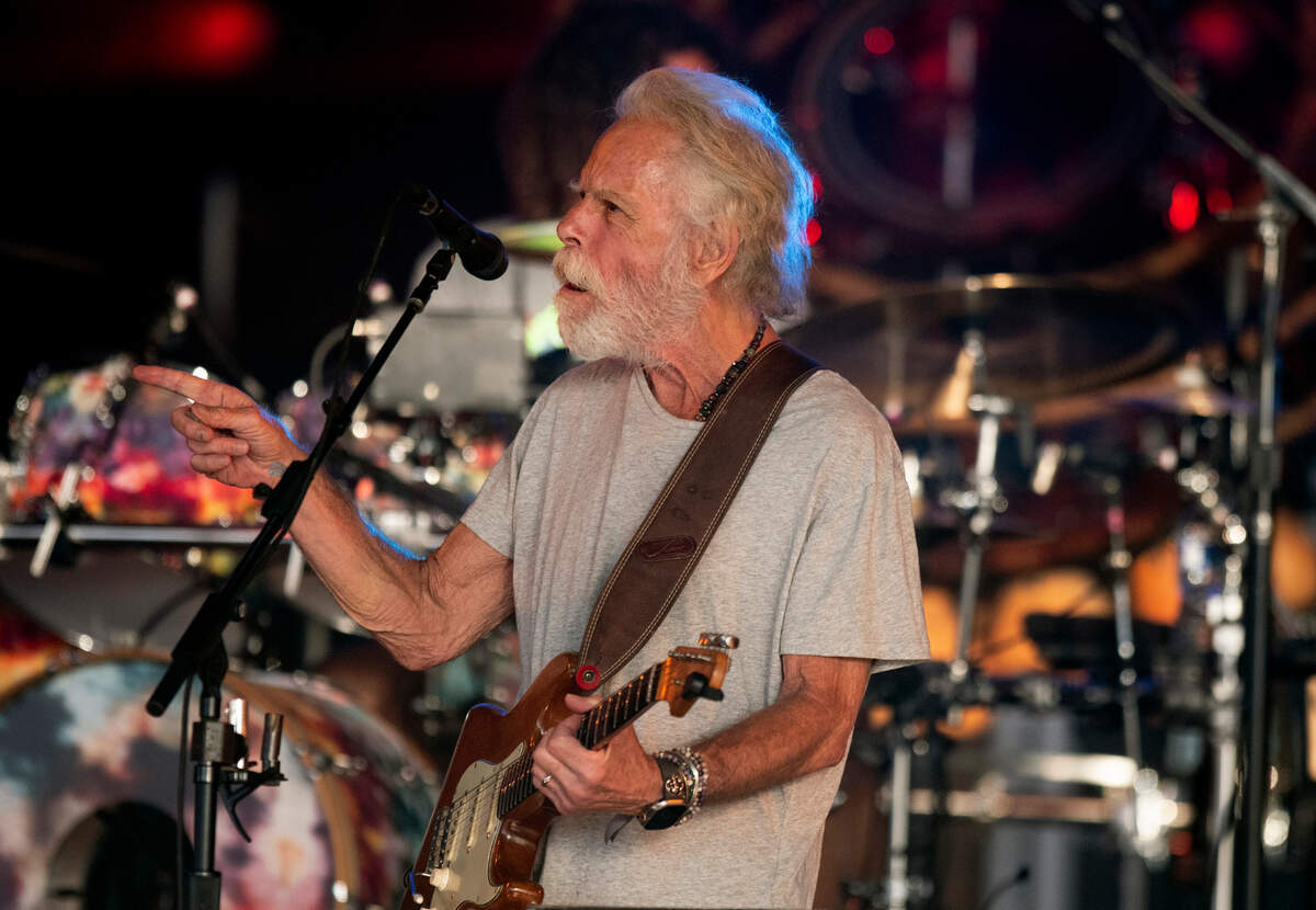 Bob Weir, one of the original members of Grateful Dead gestures to the crowd as Dead & Company perform on their final tour at Raleigh, N.C.’s Coastal Credit Union Music Park at Walnut Creek, Thursday night, June 1, 2023.