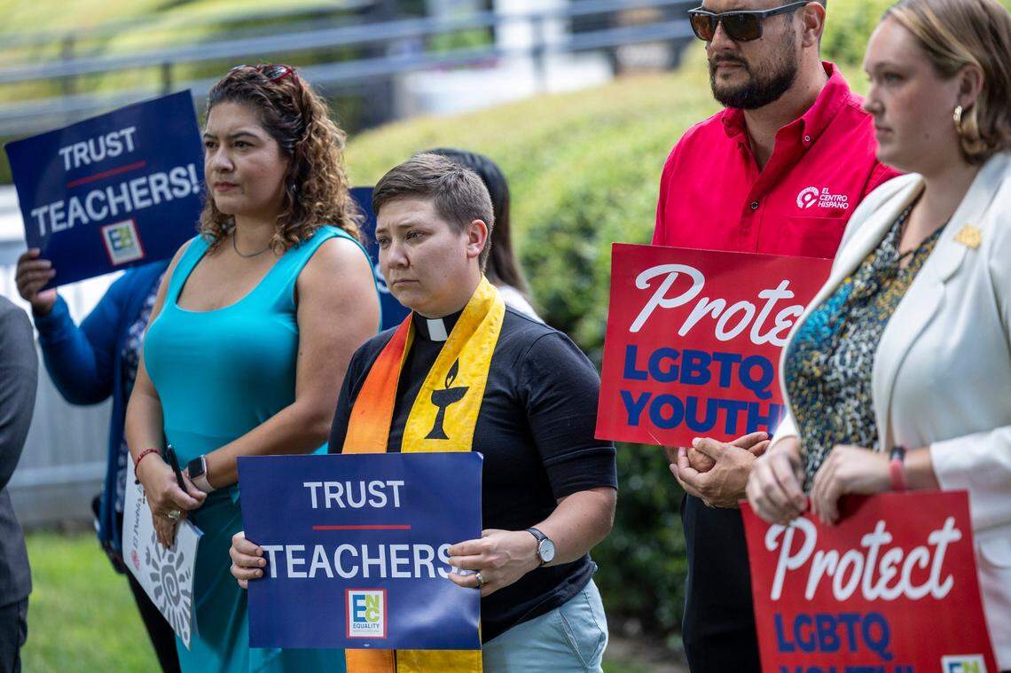 Advocates opposing veto overrides of N.C. bills banning transgender athletes and restrictions on gender-affirming care for minors hold a press conference at the Legislative Building in Raleigh on Aug. 16, 2023.