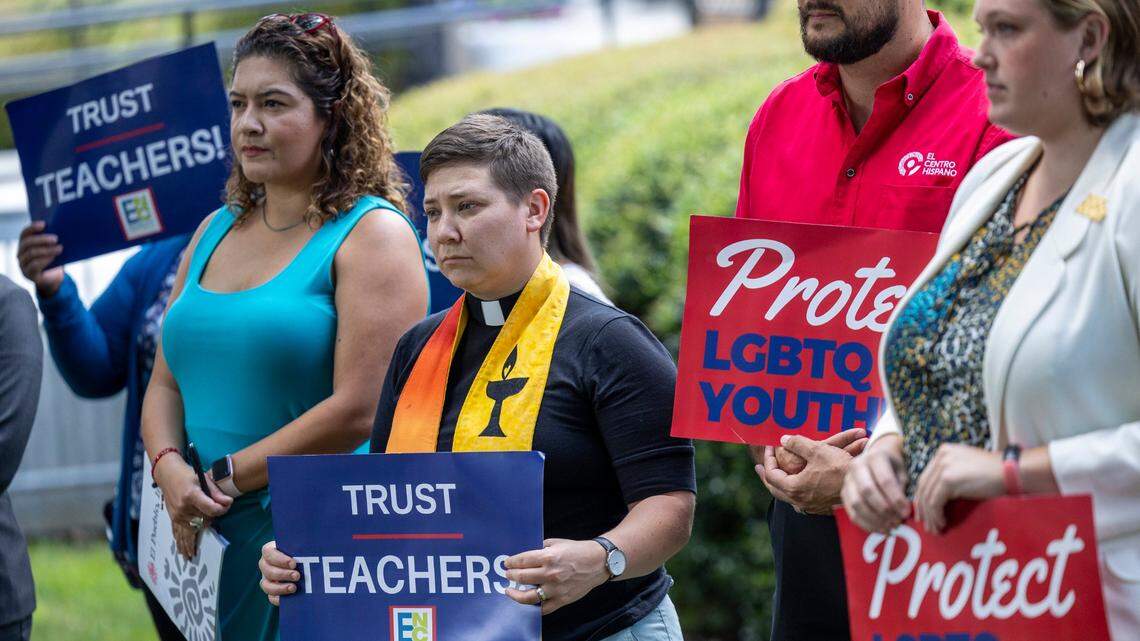 Advocates opposing veto overrides of N.C. bills banning transgender athletes and restrictions on gender-affirming care for minors hold a press conference at the Legislative Building in Raleigh on Aug. 16, 2023.