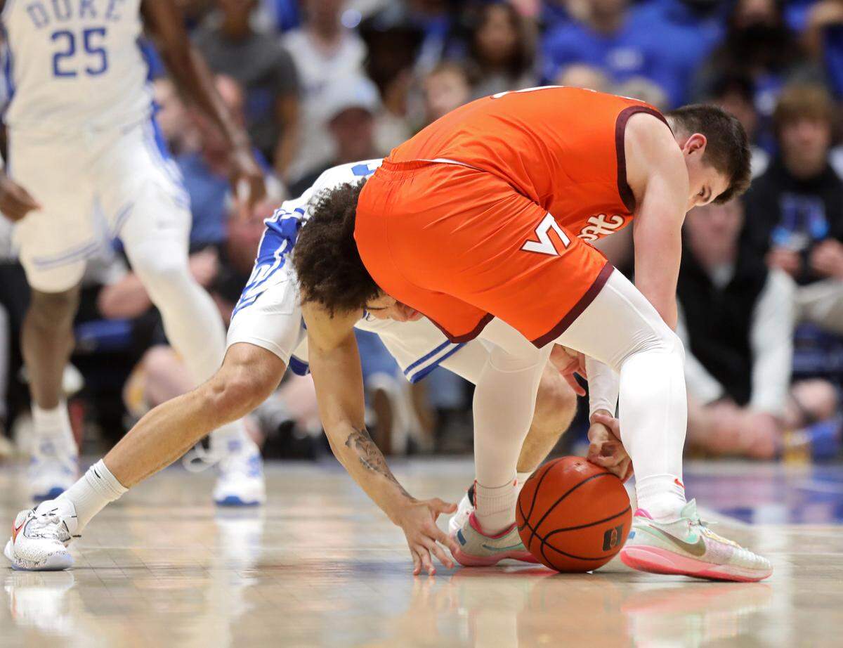 Duke’s Tyrese Proctor steals the ball from Virginia Tech’s Hunter Cattoor during the first half of the Blue Devils’ game against Virginia Tech on Saturday, Feb. 25, 2023, at Cameron Indoor Stadium in Durham, N.C.