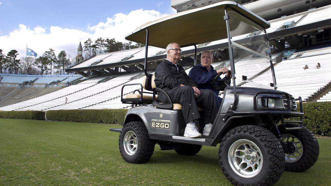 Kenan Stadium director and long time friend James Spurling gives Woody Durham a ride around the familiar surroundings of Kenan Stadium during a visit on February 8, 2017 in Chapel Hill.