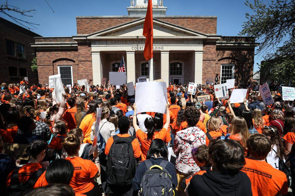Hundreds of students from Chapel Hill-Carrboro City Schools, along with parents and community members, gathered at Peace and Justice Plaza on Franklin St. on April 20, 2018, the 19th anniversary of the Columbine school shooting.