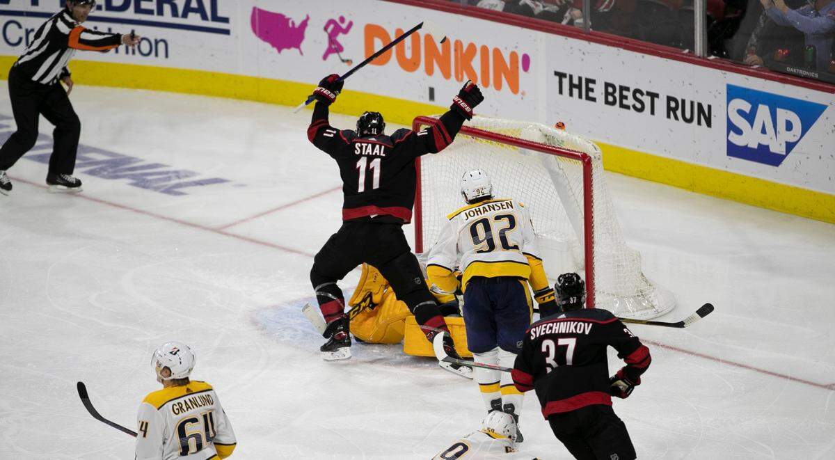 Carolina Hurricanes’ Jordan Staal (11) reacts after scoring in overtime to secure a 3-2 victory over Nashville in game five of their first round Stanley Cup Series on Tuesday, May 25, 2021 at PNC Arena in Raleigh, N.C.
