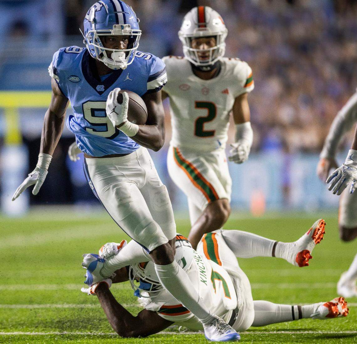 North Carolina wide receiver Devontez Walker (9) scores on an 33-yard pass completion from quarterback Drake Maye to give the Tar Heels a 28-17 lead in the third quarter against Miami on Saturday, October 14, 2023 at Kenan Stadium in Chapel Hill, N.C.