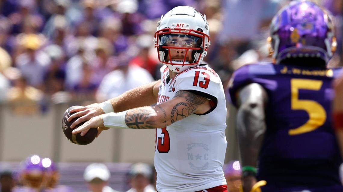 N.C. State quarterback Devin Leary (13) prepares to pass during the first half of N.C. State’s game against ECU at Dowdy-Ficklen Stadium in Greenville, N.C., Saturday, Sept. 3, 2022.