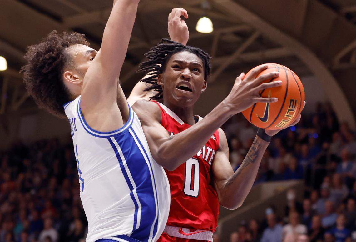 N.C. State’s Terquavion Smith (0) is defended by Duke’s Dereck Lively II (1) during the second half of Duke’s 71-67 victory over N.C. State at Cameron Indoor Stadium in Durham, N.C., Tuesday, Feb. 28, 2023.