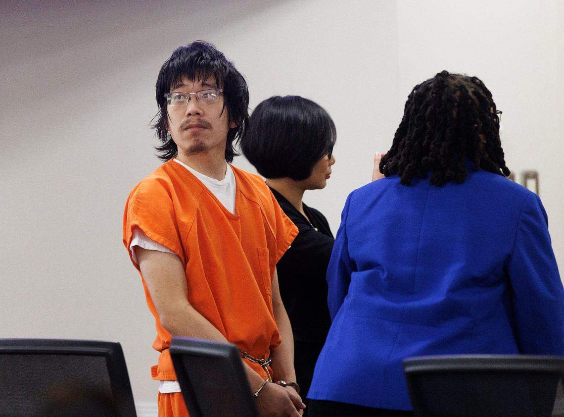 Tailei Qi, 34, listens in a courtroom at the Orange County Courthouse on Monday, Nov. 27, 2023, in Hillsborough, N.C. Qi, who is charged with killing UNC professor Zijie Yan, was found mentally ill and unfit to continue with court proceedings on Monday.