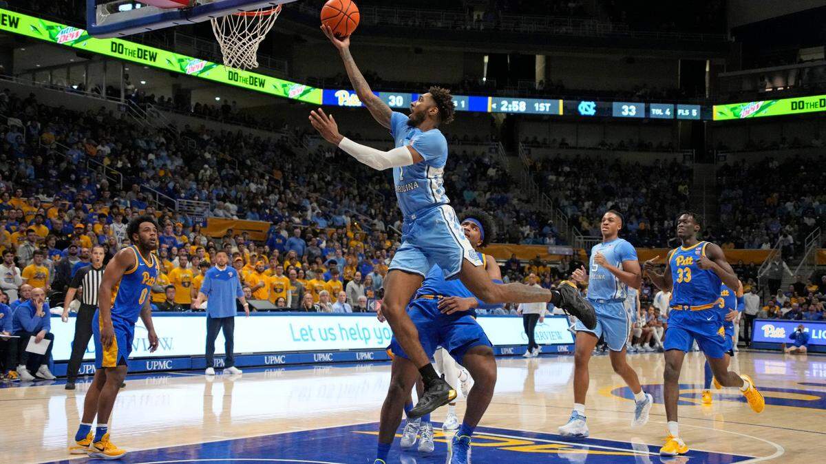North Carolina forward Leaky Black (1) puts up a shot during the first half of an NCAA college basketball game against Pittsburgh in Pittsburgh, Friday, Dec. 30, 2022. (AP Photo/Gene J. Puskar)