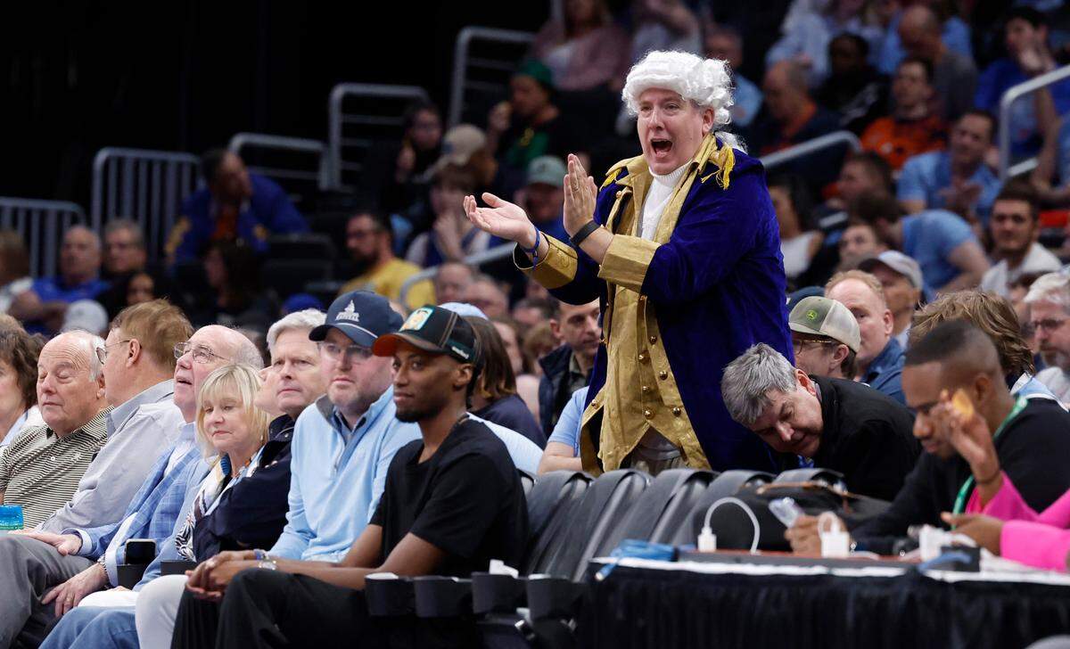 Fans cheer on North Carolina during the first half of UNC’s game against Florida State in the quarterfinal round of the 2024 ACC Men’s Basketball Tournament at Capital One Arena in Washington, D.C., Thursday, March 14, 2024.