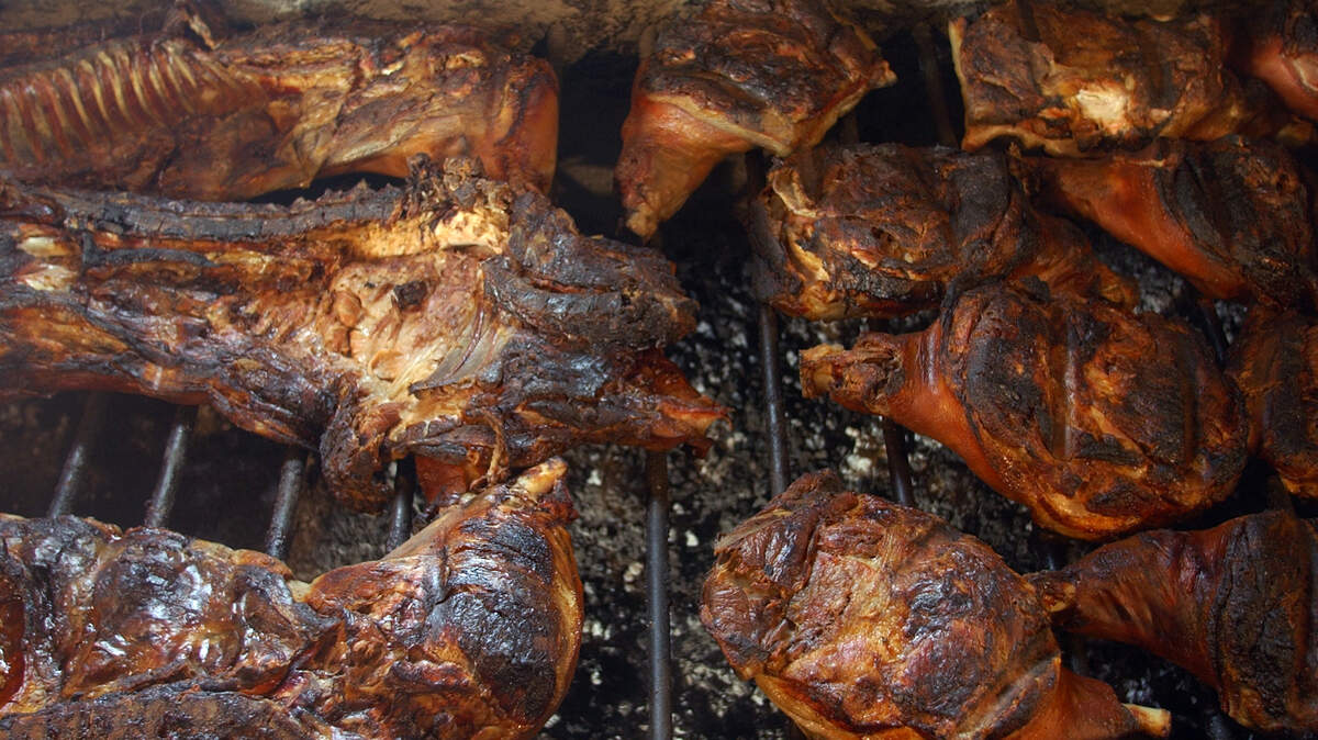 Pork shoulders, hams, ribs and other parts of hog wait to be chopped into eastern North Carolina style barbecue at Wilber’s in Goldsboro.