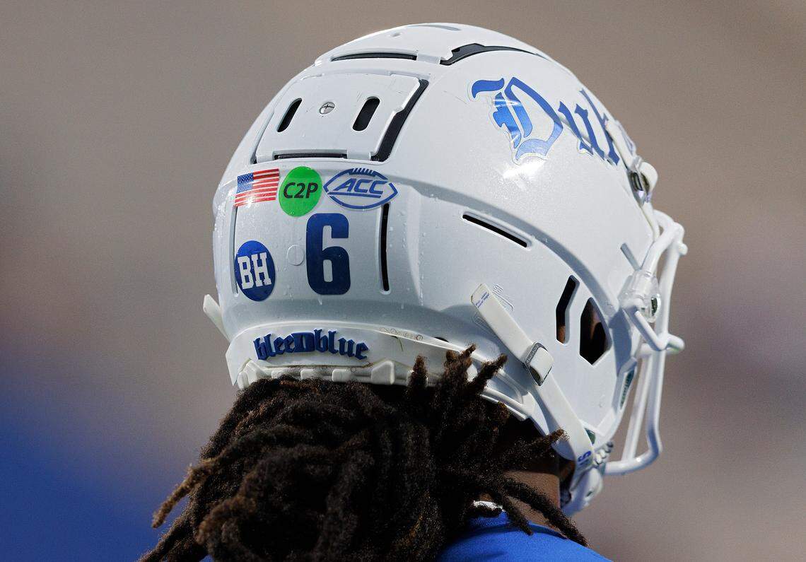 A green dot on the helmet of Duke quarterback Maalik Murphy, seen prior to the Blue Devils’ home game against Elon on Friday, Aug. 30, 2024, denotes the ability to participate in coach-to-player communication.