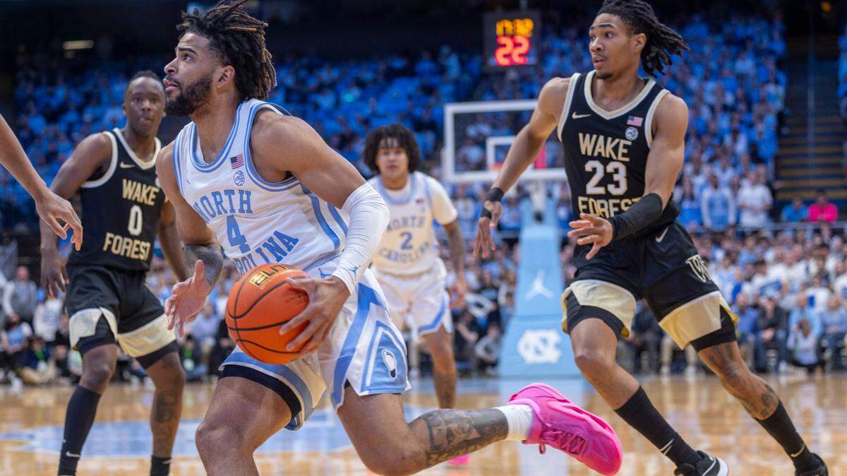 North Carolina’s R.J. Davis (4) breaks to the basket past Wake Forest’s Hunter Sallis (23) in the first half on Monday, January 22, 2024 at the Smith Center in Chapel Hill, N.C. Davis led all scores with a career high 36 points.