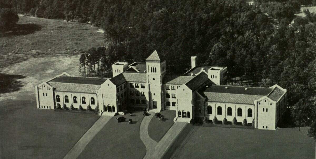 Broughton High School’s first yearbook (1930) features an aerial photo of the school and its vicinity. The clock has not yet been installed in the clock tower and the area behind the school is yet to be developed.
