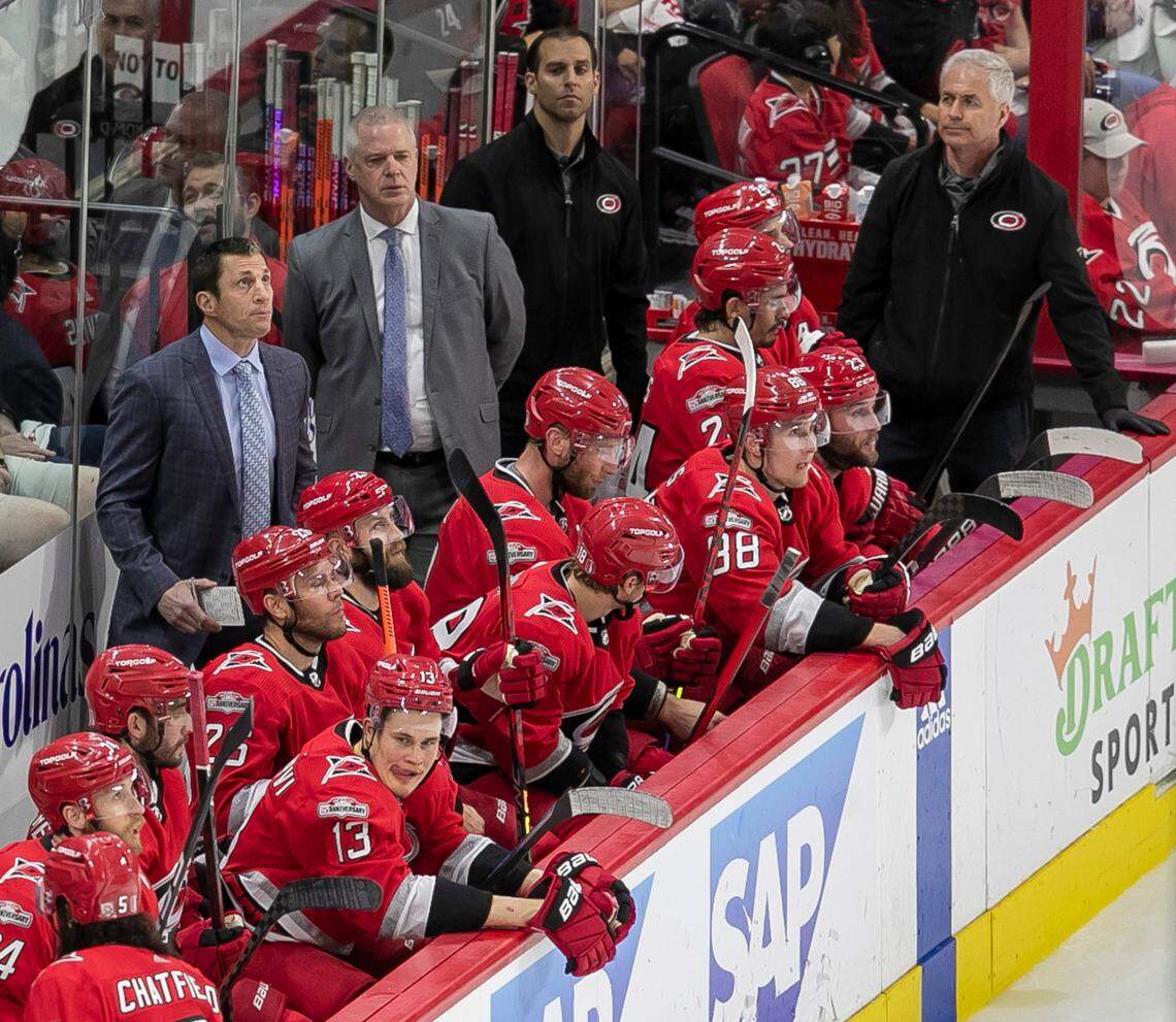 Carolina Hurricanes coach Rod Birnd’Amour checks the scoreboard in the second period against the New Jersey Devils during Game 2 of their second round Stanley Cup playoff series on Friday, May 5, 2023 at PNC Arena in Raleigh, N.C.