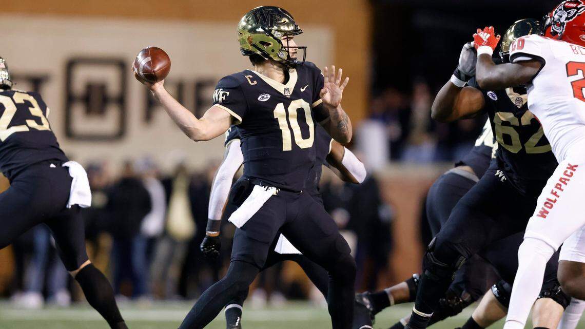 Wake Forest quarterback Sam Hartman (10) prepares to pass during the first half of N.C. States game against Wake Forest at Truist Field in Winston-Salem, N.C., Saturday, November 13, 2021.