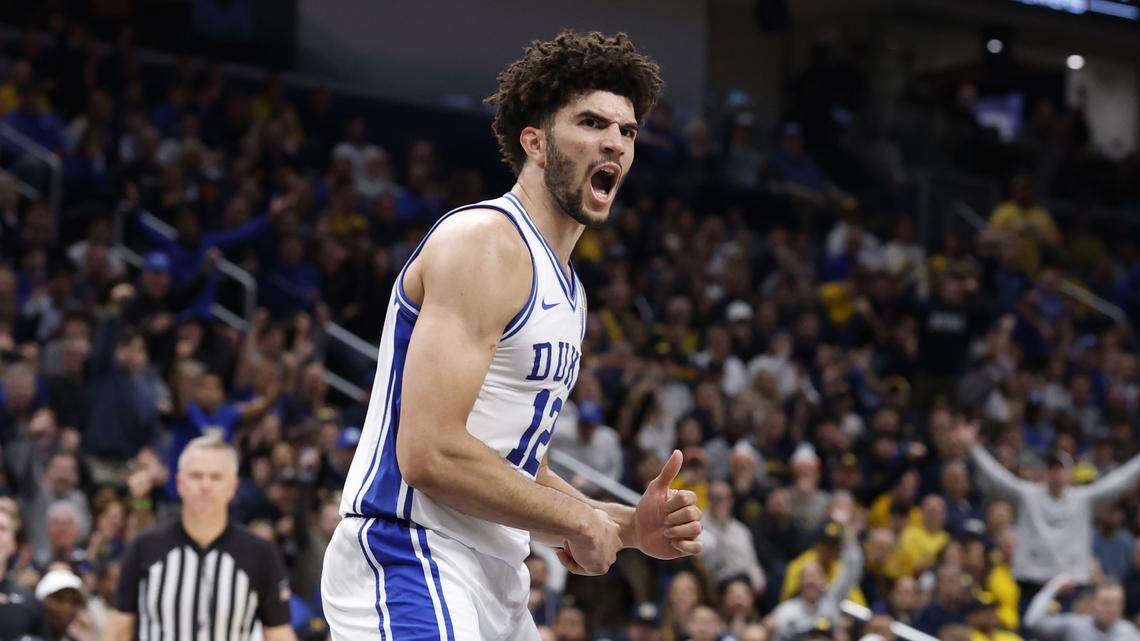 Duke’s Cameron Boozer (12) celebrates after slamming in two in the second half of Duke’s 68-63 victory over Michigan in the Capital Showcase at Capital One Arena in Washington, D.C., Saturday, Feb. 21, 2026.