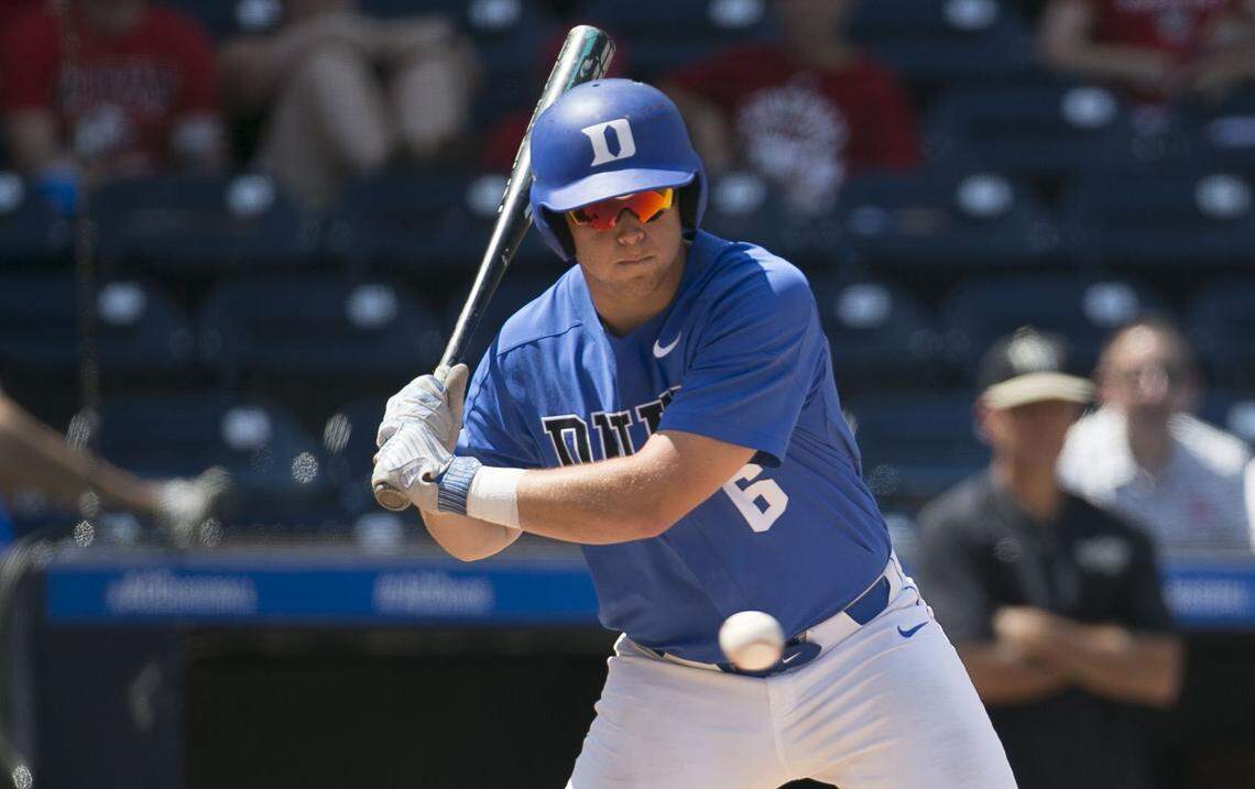 Duke's Jack Labosky  (6) takes ball four from Wake Forest pitcher Antonio Melendez in the 13th inning, allowing Duke teammate Griffin Conine (9) to score, giving the Blue Devils a 3-2 lead during the ACC Championship on Thursday, May 24, 2018, at Durham Bulls Athletic Park in Durham, N.C.