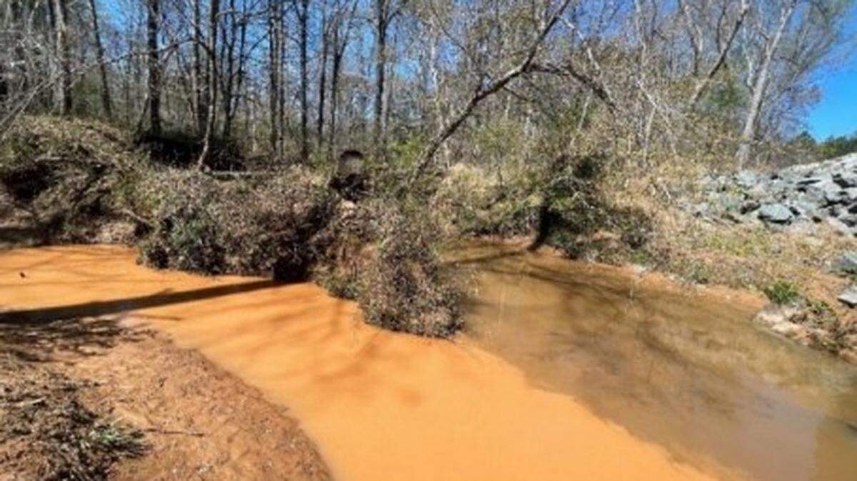 Sound Rivers and the Southern Environmental Law Center are suing Clayton Properties Group, alleging a development in Southeast Durham is resulting in significant sediment pollution to nearby waterways. The Sweetbrier development is allegedly sending sediment into Martin Branch, shown on the left here meeting Lick Creek before flowing into Falls Lake.