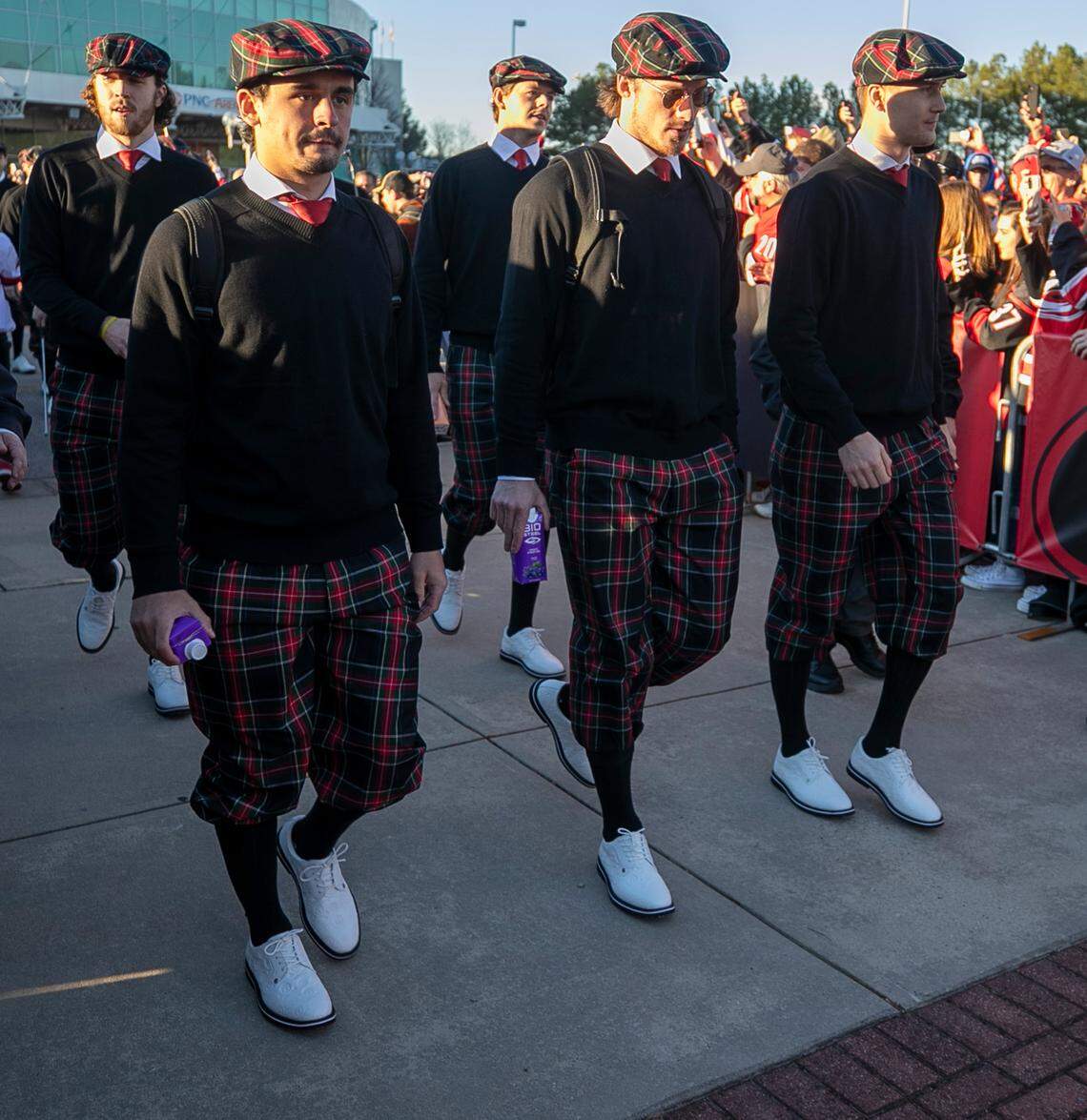 Carolina Hurricanes’s Seth Jarvis, left, and his teammates arrive for their Stadium Series game against the Washington Capitals on Saturday, February 18, 2022 at Carter-Finley Stadium in Raleigh, N.C.