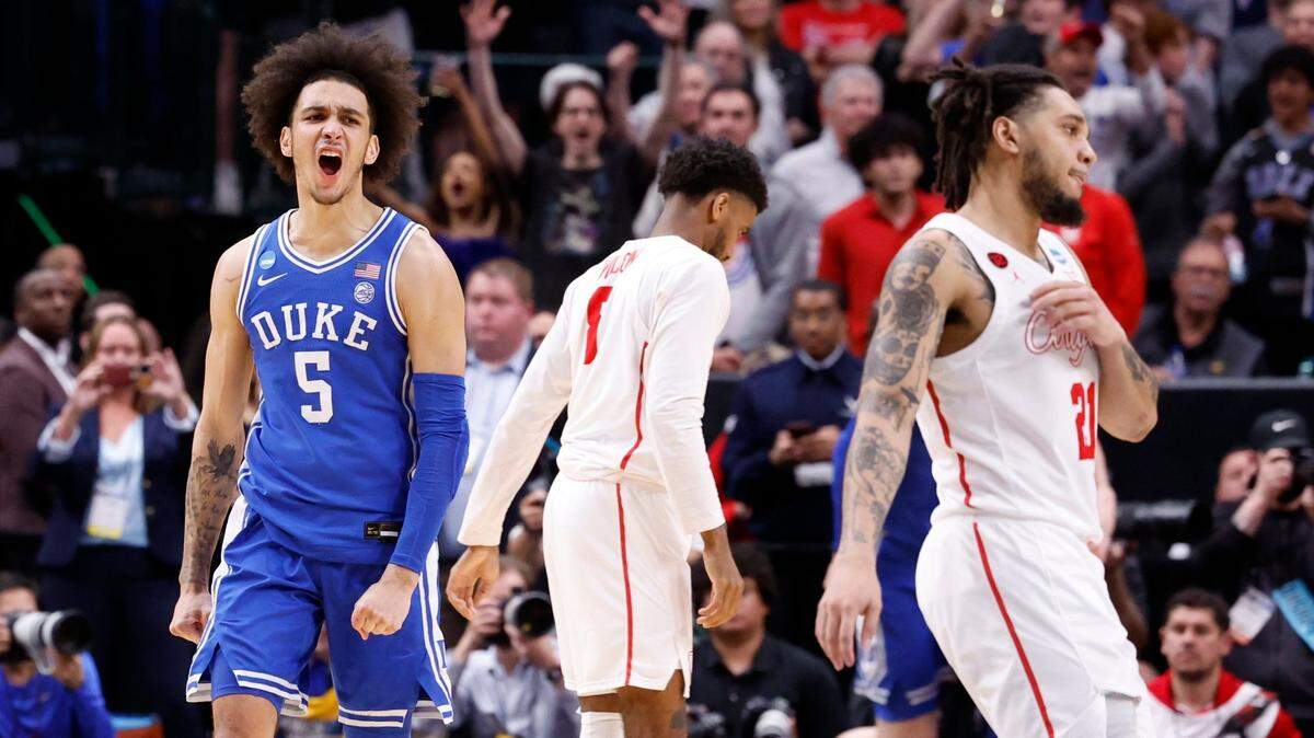 Duke’s Tyrese Proctor (5) celebrates as time expires in Duke’s 54-51 victory over Houston in their NCAA Tournament Sweet 16 game at the American Airlines Center in Dallas, Texas, Friday, March 29, 2024.