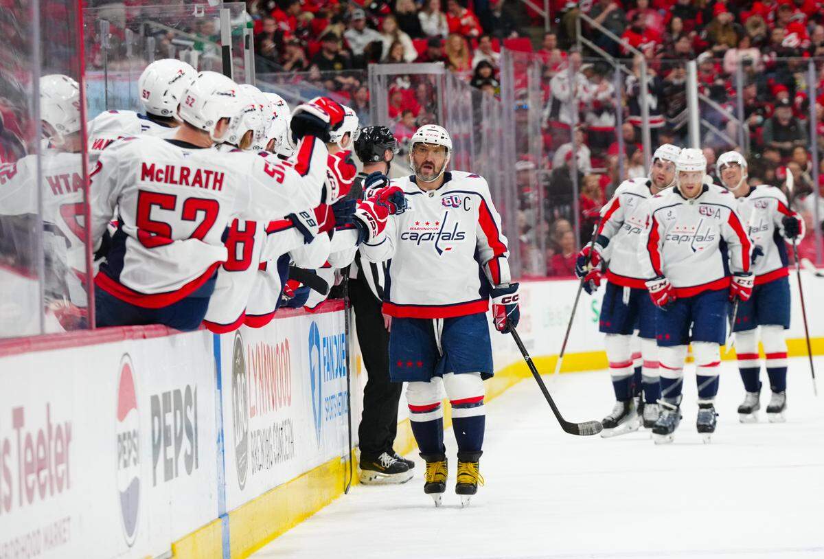 Washington Capitals left wing Alex Ovechkin (8) celebrates his goal during the first period against the Carolina Hurricanes at Lenovo Center.