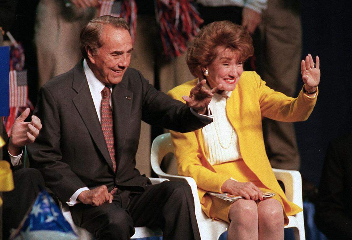 Presidential candidate Sen. Bob Dole and wife Elizabeth wave to a crowd of supporters in the Catawba College gym during a barbecue rally for the two in 1996. Elizabeth Dole is a native of Salisbury.