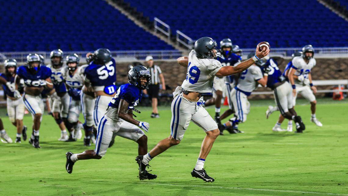Duke senior wide receiver Jake Bobo (19) makes a one-handed catch of a pass during a team scrimmage on Saturday, Aug. 14, 2021, at Wallace Wade Stadium in Durham