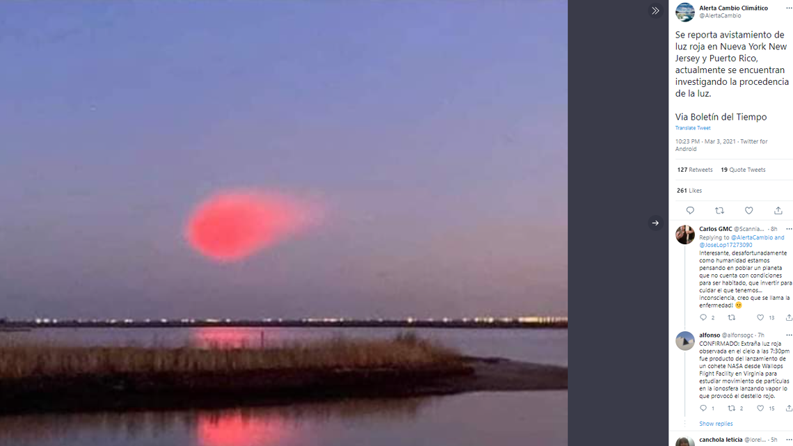 Social media erupted Wednesday with reports of a mysterious red cloud floating off the East Coast. NASA says the cloud was associated with a rocket launch.