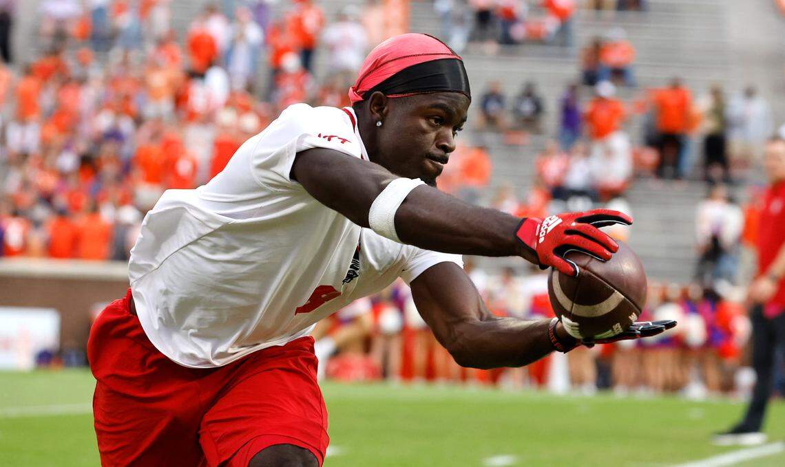 N.C. State wide receiver Julian Gray pulls in a pass while warming up before N.C. State’s game against Clemson at Memorial Stadium in Clemson, S.C., Saturday, Oct. 1, 2022.