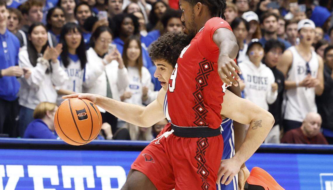 Duke’s Spencer Hubbard (55) drives by Incarnate Word’s Amani Drummond (99) during the second half of Duke’s 72-46 victory over Incarnate Word at Cameron Indoor Stadium in Durham, N.C., Tuesday, Dec. 10, 2024.