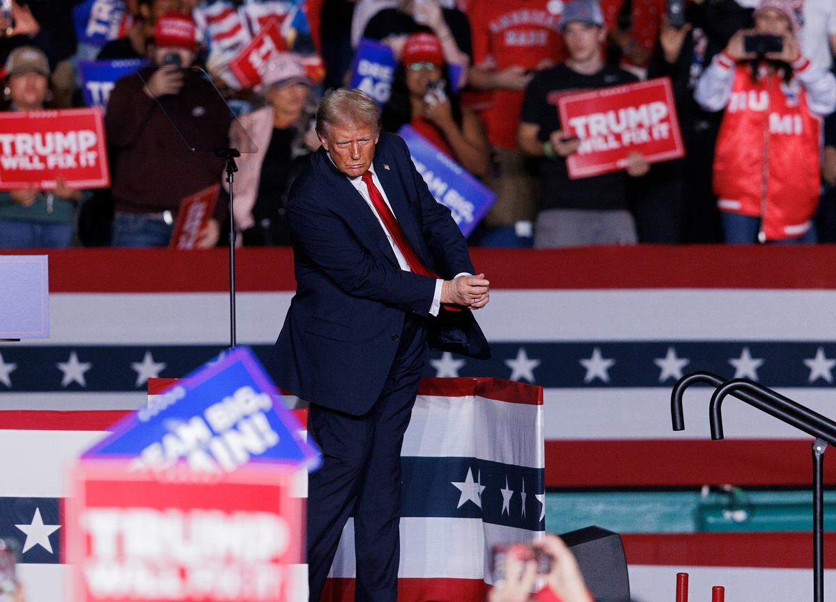 Former President and Republican presidential candidate Donald Trump dances at the conclusion of his remarks at a campaign rally at First Horizon Coliseum in Greensboro, N.C. on Saturday, Nov. 2, 2024.