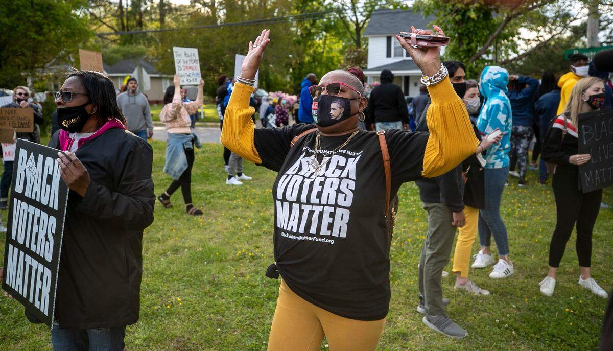 Demonstrators gather at the intersection of Roanoke Avenue and Perry Streets on Thursday, April 22, 2021, the location where Andrew Brown Jr. lost his life after he was shot by a Pasquotank Deputy Sheriff on Wednesday. Nearly 300 people participated in the peaceful march and demonstration.