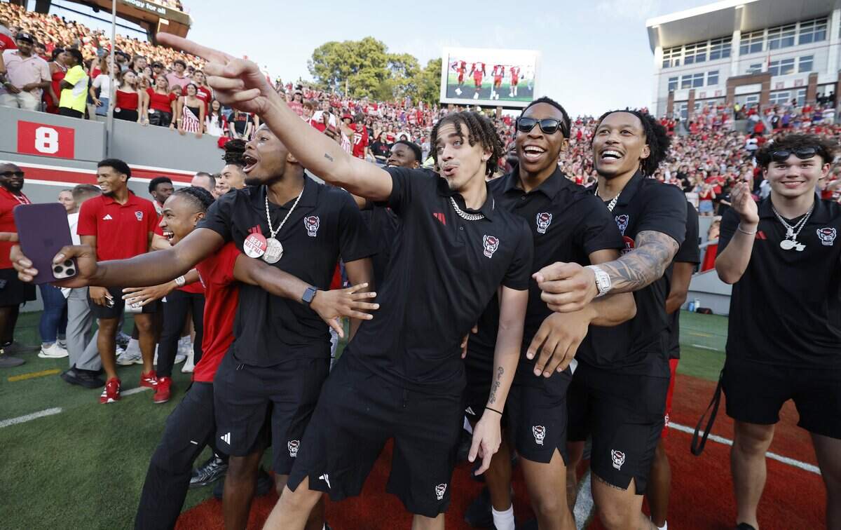 The Wolfpack basketball team taunts the East Carolina football team before N.C. State’s game against ECU at Carter-Finley Stadium in Raleigh, N.C., Thursday, August 28, 2025.