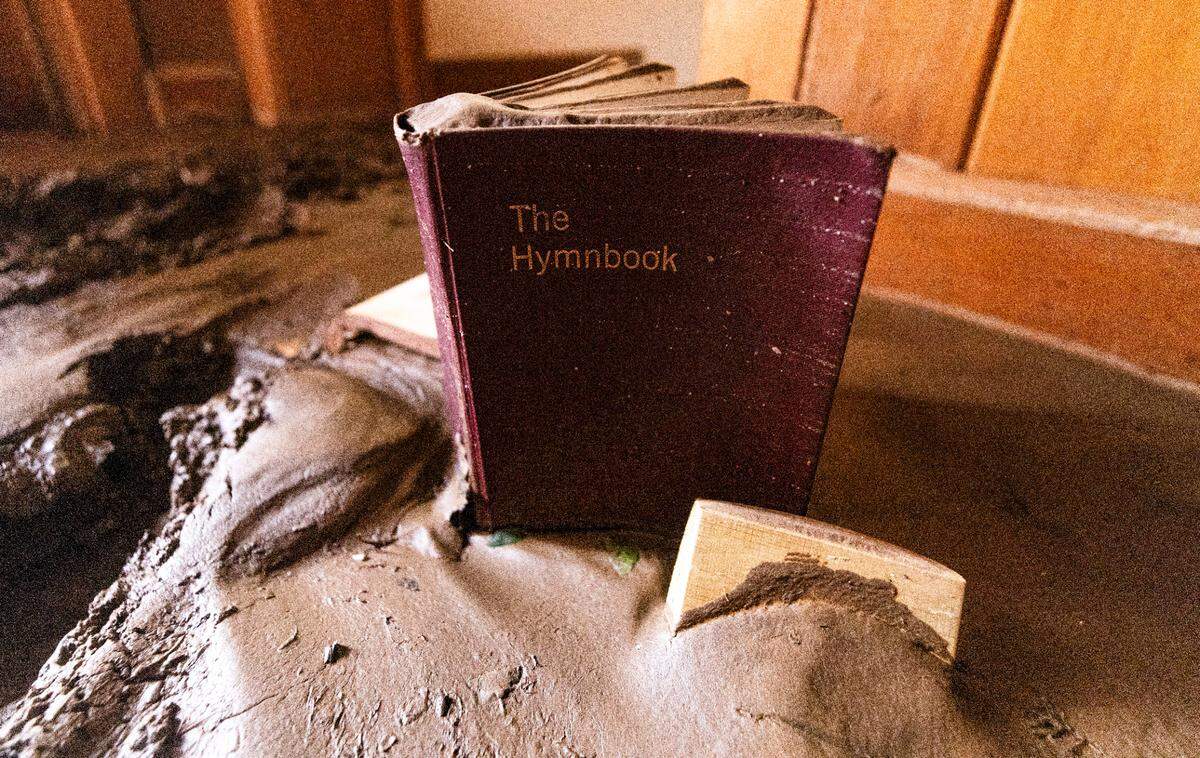 Mud covers the interior of Marshall Presbyterian Church in downtown Marshall on Tuesday, Oct. 1, 2024 after the French Broad River caused catastrophic flooding. The remnants of Hurricane Helene caused widespread flooding, downed trees, and power outages in western North Carolina.
