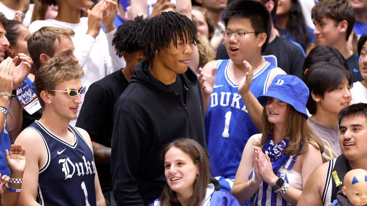 Shelton Henderson, center, is greeted by the Cameron Crazies during Duke’s Countdown to Craziness at Cameron Indoor Stadium in Durham, N.C., Friday, Oct. 4, 2024.