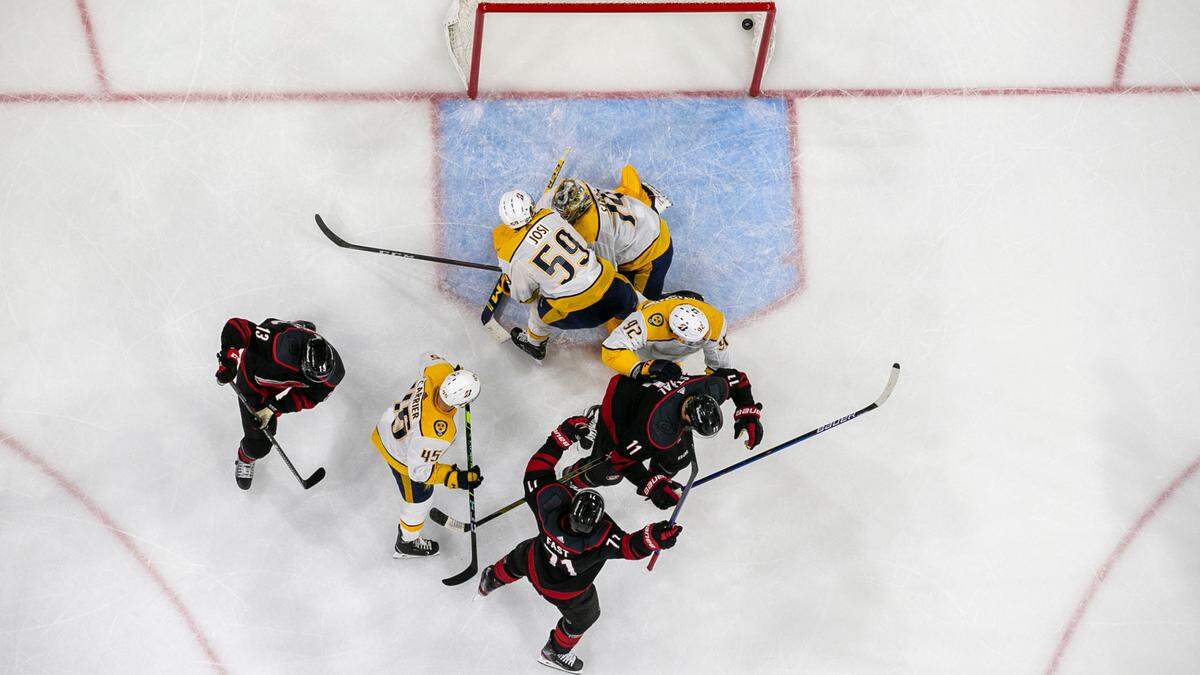 Carolina Hurricanes’ Jordan Staal (11) reacts after scoring at the 12:22 mark of the second period, with the puck coming off his skate. The goal was challenged, reviewed and nullified after video showed Warren Foegele (13) interfering with goalie Juuse Saros (74) earlier in the play on Tuesday, May 25, 2021 at PNC Arena in Raleigh, N.C.