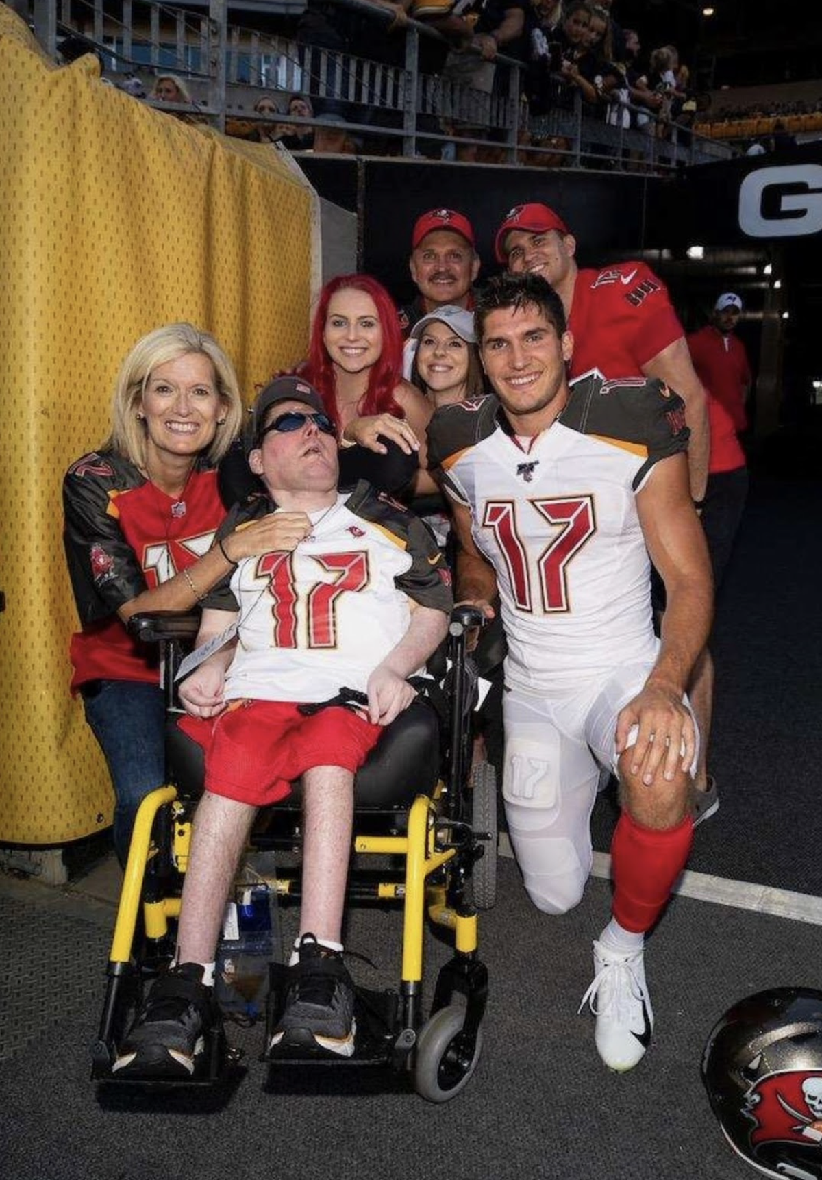 The Watsons bring their eldest son, Tommy, to a Tampa Bay Buccaneers game. Their second son, Justin, is a three-time Super Bowl champion, winning Super Bowl LV with the Buccaneers and Super Bowl LVII and LVIII with the Chiefs, where he is still a wide receiver.