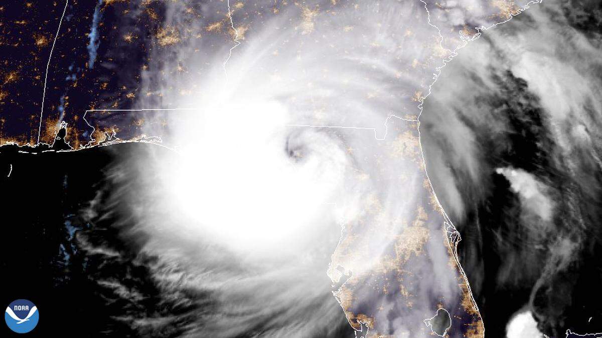 Satellite imagery shows Hurricane Helene making landfall in Florida and churning toward Western North Carolina.