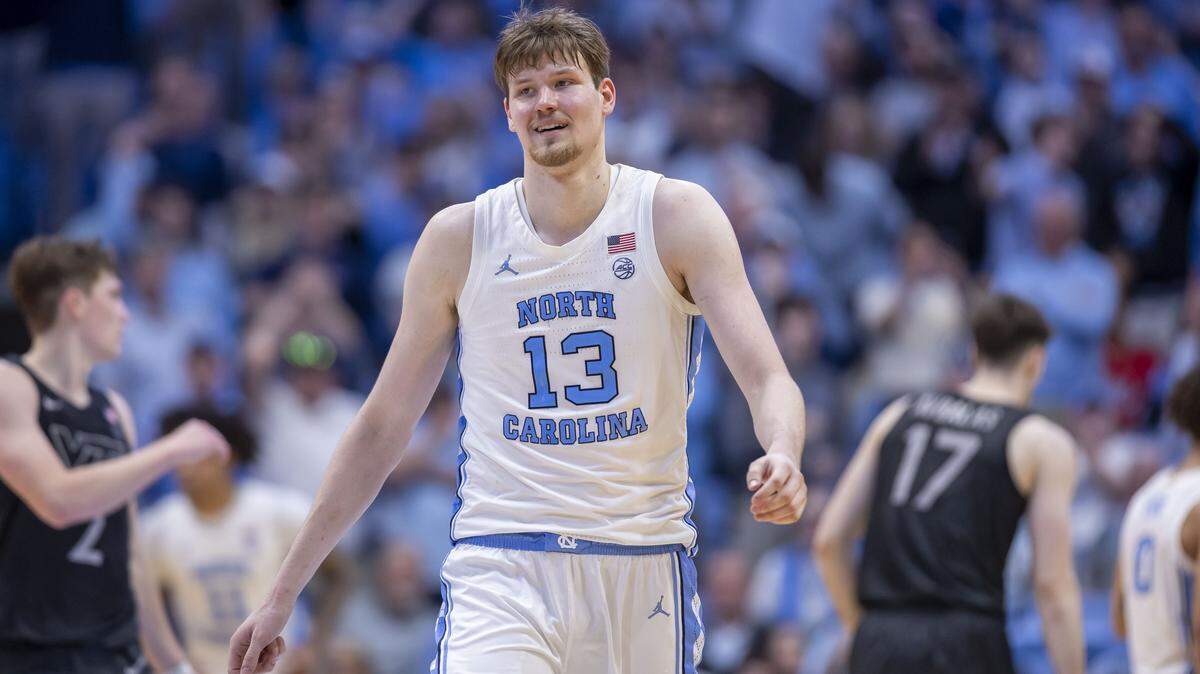 North Carolina center Henri Veesaar (13) flashes a smile after a dunk on a fast break in the final minute of play against Virginia Tech on Saturday, February 28, 2026 at the Smith Center in Chapel Hill, N.C.  Veesaar lead all scores with 26 points. 