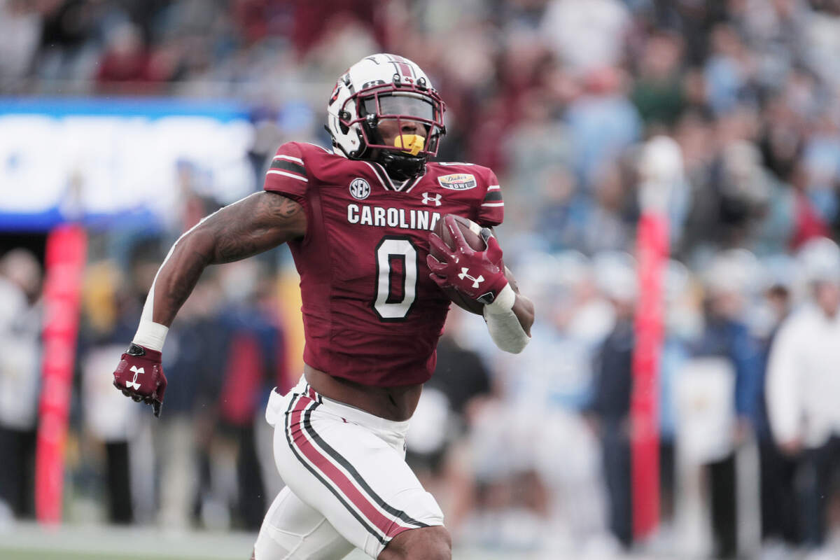 South Carolina Gamecocks tight end Jaheim Bell (0) score a touchdown against North Carolina at the Duke’s Mayo Bowl at Bank of America Stadium in Charlotte, North Carolina on Thursday, December 30, 2021.