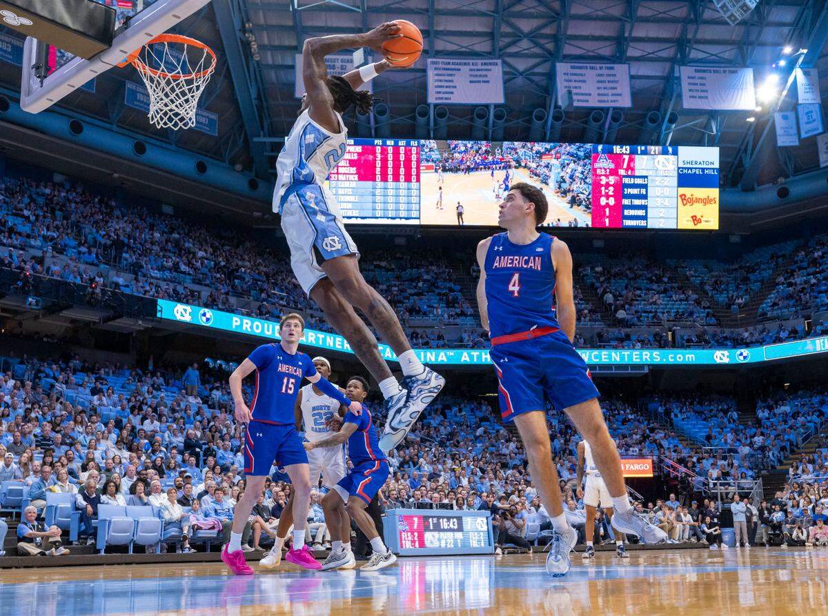 North Carolina forward Jae’Lyn Withers (24) breaks to the basket for a dunk against American University’s Lincoln Ball (4) in the first half on Friday, November 15, 2024 at the Smith Center in Chapel Hill, N.C.